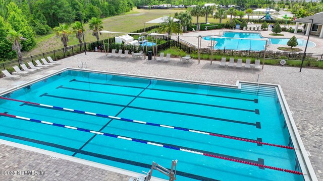 2304 Shady Breeze Ln, Green Cove Springs, FL 32043 - community pool with fence and a patio area