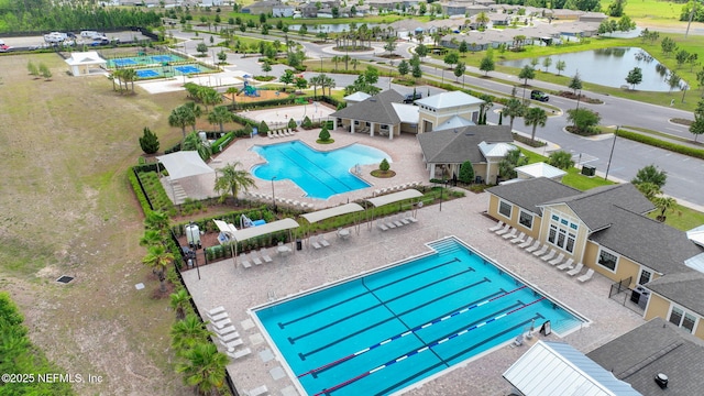 2304 Shady Breeze Ln, Green Cove Springs, FL 32043 - aerial perspective of suburban area with a pool and a nearby body of water