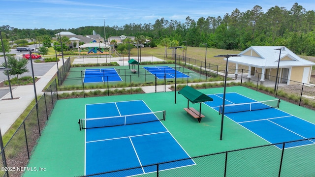 2304 Shady Breeze Ln, Green Cove Springs, FL 32043 - view of tennis court featuring fence