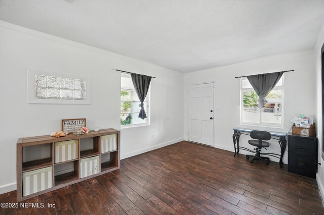 5388 Woodcrest Rd, Jacksonville, FL 32205 - foyer entrance featuring wood-type flooring and baseboards