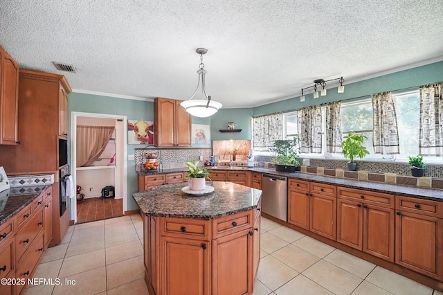 5388 Woodcrest Rd, Jacksonville, FL 32205 - kitchen with dishwasher, a sink, decorative backsplash, brown cabinetry, and a textured ceiling