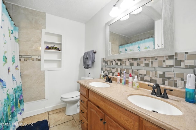 5388 Woodcrest Rd, Jacksonville, FL 32205 - bathroom featuring backsplash, toilet, tile patterned floors, double vanity, and a shower with shower curtain