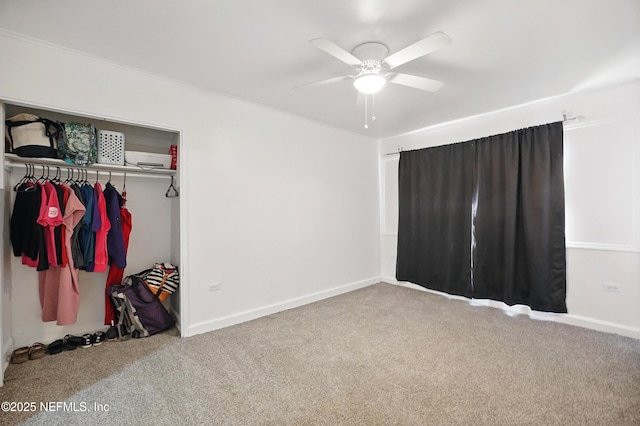 5388 Woodcrest Rd, Jacksonville, FL 32205 - unfurnished bedroom with carpet flooring, a closet, baseboards, ceiling fan, and crown molding