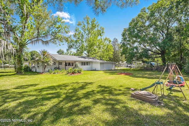 5388 Woodcrest Rd, Jacksonville, FL 32205 - view of yard with a playground