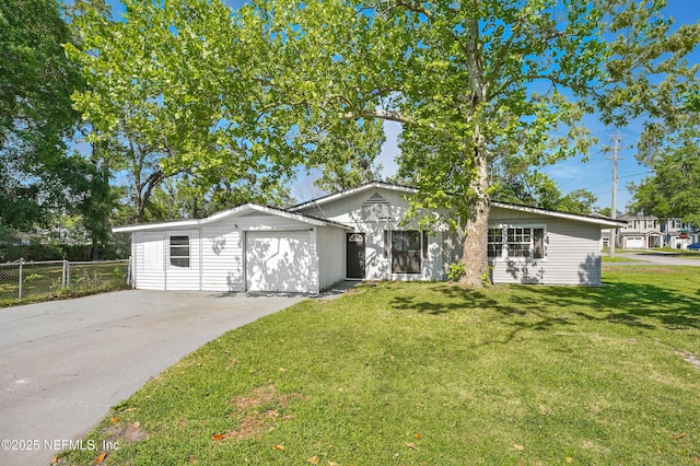 5388 Woodcrest Rd, Jacksonville, FL 32205 - ranch-style house with driveway and an attached garage