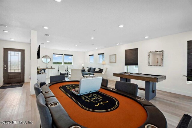 2777 S Ponte Vedra Blvd, Ponte Vedra Beach, FL 32082 - living room with light wood-style flooring, recessed lighting, and baseboards