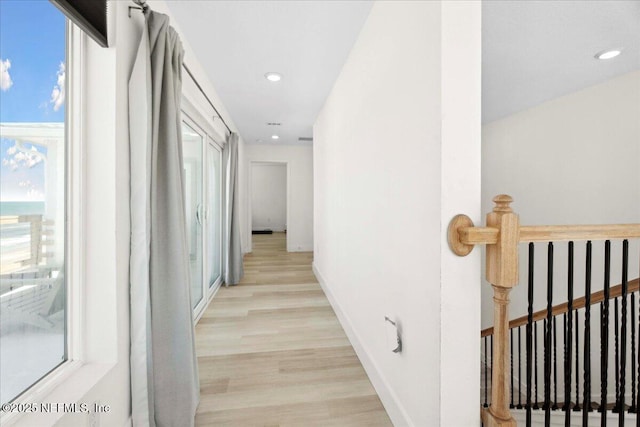 2777 S Ponte Vedra Blvd, Ponte Vedra Beach, FL 32082 - hall featuring light wood-style flooring, plenty of natural light, recessed lighting, baseboards, and an upstairs landing