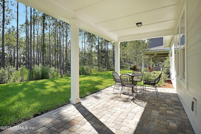 view of patio featuring outdoor dining space