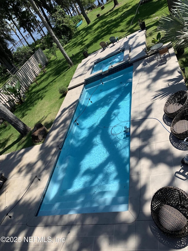 182 N Ridge Dr, Fleming Island, FL 32003 - view of pool featuring a lawn, a patio area, and a pool with connected hot tub