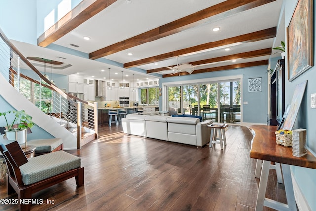 182 N Ridge Dr, Fleming Island, FL 32003 - living room featuring beam ceiling, stairs, dark wood finished floors, ceiling fan, and recessed lighting