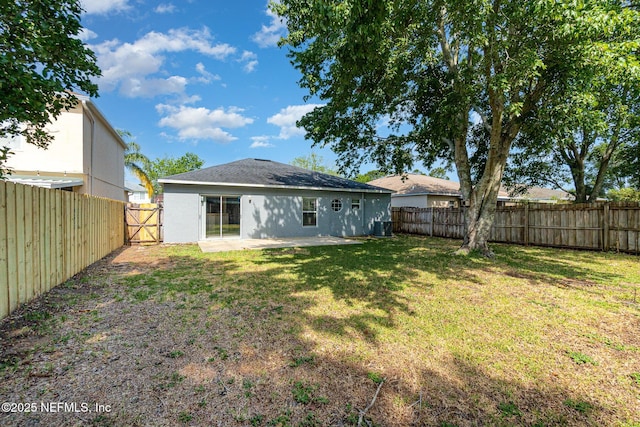 133 Sterling Hill Dr, Jacksonville, FL 32225 - rear view of house with a gate, a patio area, central AC unit, and stucco siding