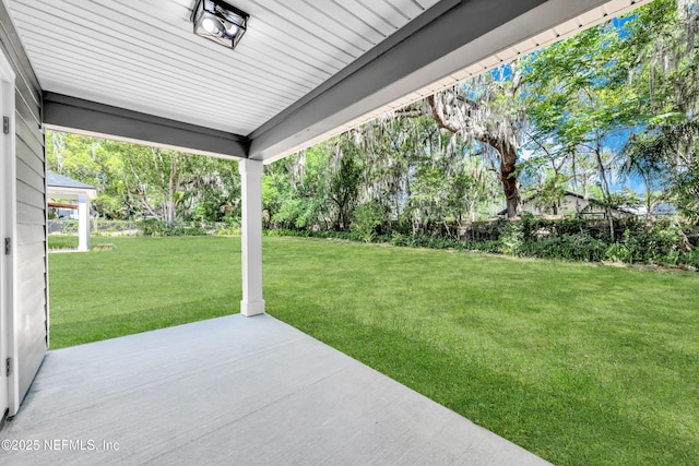 1902 Gillis St, Palatka, FL 32177 - view of grassy yard with a patio area