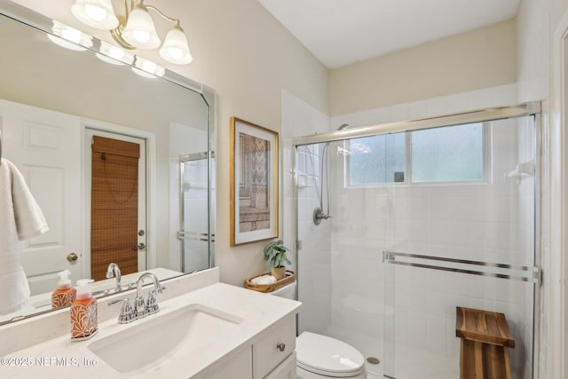 1700 Eagle Watch Dr, Fleming Island, FL 32003 - full bathroom with a shower stall, vanity, and toilet