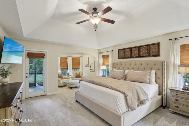 1700 Eagle Watch Dr, Fleming Island, FL 32003 - bedroom featuring light colored carpet, access to exterior, and a tray ceiling