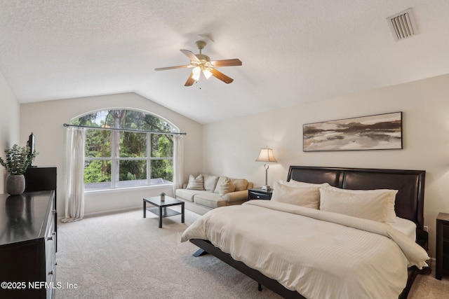 1700 Eagle Watch Dr, Fleming Island, FL 32003 - bedroom featuring carpet flooring, vaulted ceiling, ceiling fan, a textured ceiling, and baseboards