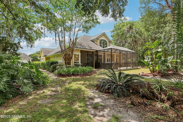 1700 Eagle Watch Dr, Fleming Island, FL 32003 - back of property with a lanai