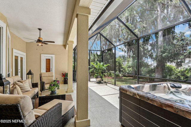 1700 Eagle Watch Dr, Fleming Island, FL 32003 - sunroom / solarium with a jacuzzi, ceiling fan, and an outdoor hangout area