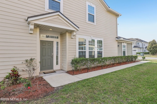168 Nelson Ln, Saint Johns, FL 32259 - doorway to property with a yard