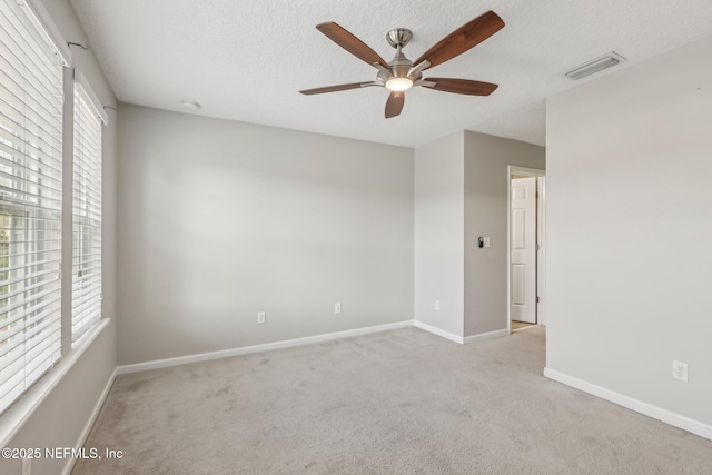 168 Nelson Ln, Saint Johns, FL 32259 - carpeted empty room with ceiling fan, baseboards, and a textured ceiling