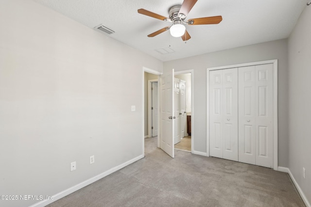 168 Nelson Ln, Saint Johns, FL 32259 - unfurnished bedroom featuring carpet flooring, baseboards, a closet, and ceiling fan