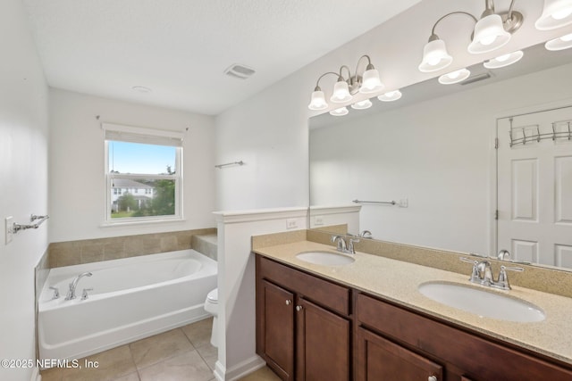 168 Nelson Ln, Saint Johns, FL 32259 - bathroom with tile patterned flooring, a garden tub, double vanity, and toilet