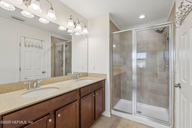 168 Nelson Ln, Saint Johns, FL 32259 - full bath featuring a shower stall, tile patterned flooring, and double vanity
