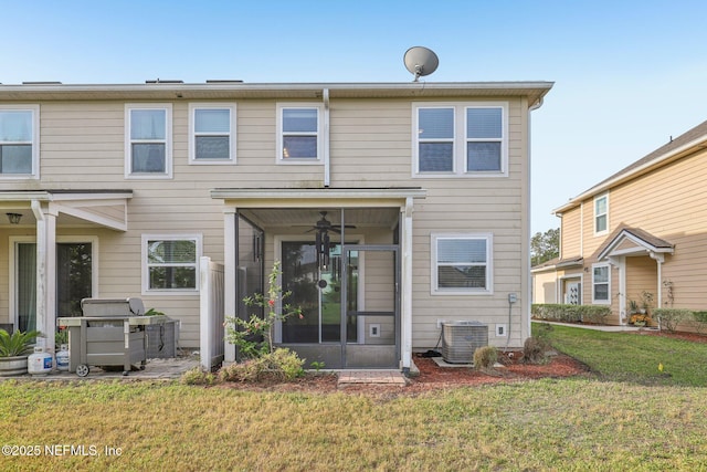 168 Nelson Ln, Saint Johns, FL 32259 - rear view of property featuring cooling unit, a yard, a sunroom, and ceiling fan