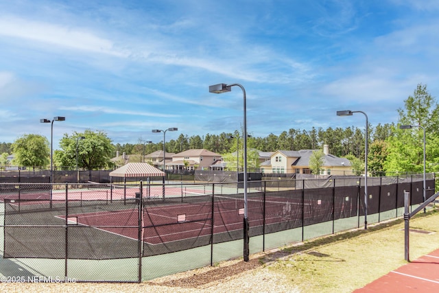 168 Nelson Ln, Saint Johns, FL 32259 - view of tennis court with fence and a residential view