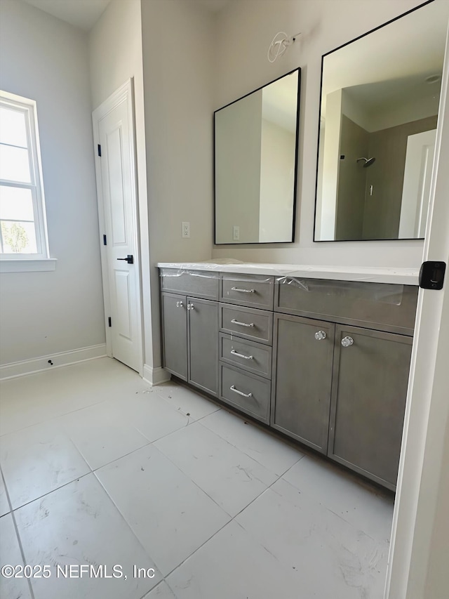 99 Sullivan Pl, Saint Johns, FL 32259 - full bathroom featuring double vanity and baseboards