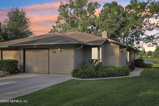 9250 Arbolita Way, Jacksonville, FL 32256 - ranch-style house featuring concrete driveway, a front yard, a chimney, and a garage