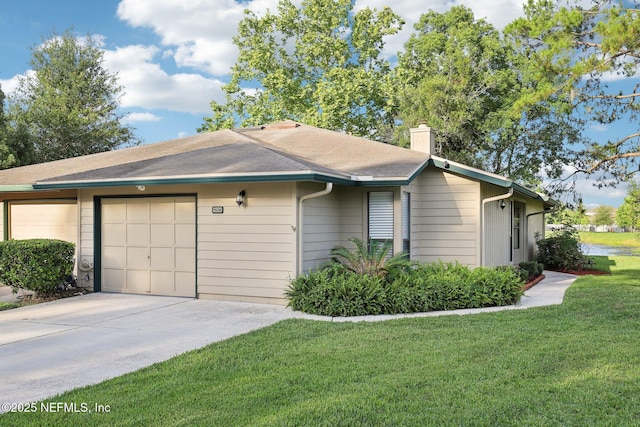 9250 Arbolita Way, Jacksonville, FL 32256 - view of front facade with an attached garage, a front lawn, concrete driveway, and a chimney
