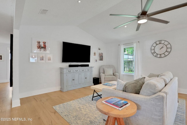 1257 12th St N, Jacksonville Beach, FL 32250 - living area featuring ceiling fan, vaulted ceiling, light wood-style floors, baseboards, and recessed lighting
