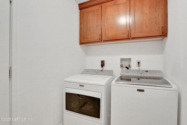 1257 12th St N, Jacksonville Beach, FL 32250 - clothes washing area featuring cabinet space and washer and dryer
