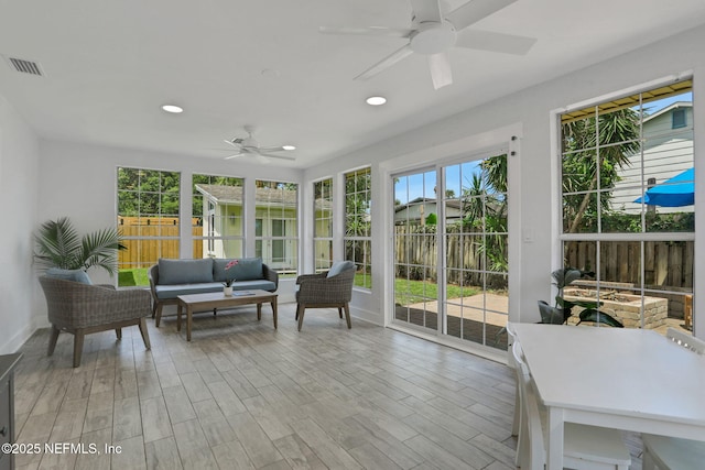 1257 12th St N, Jacksonville Beach, FL 32250 - sunroom / solarium with ceiling fan, outdoor lounge area, wood finished floors, and recessed lighting