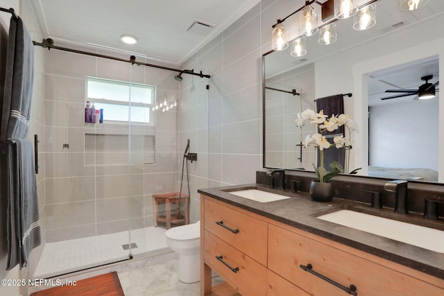 1257 12th St N, Jacksonville Beach, FL 32250 - bathroom with a shower stall, marble look tile flooring, toilet, double vanity, and crown molding