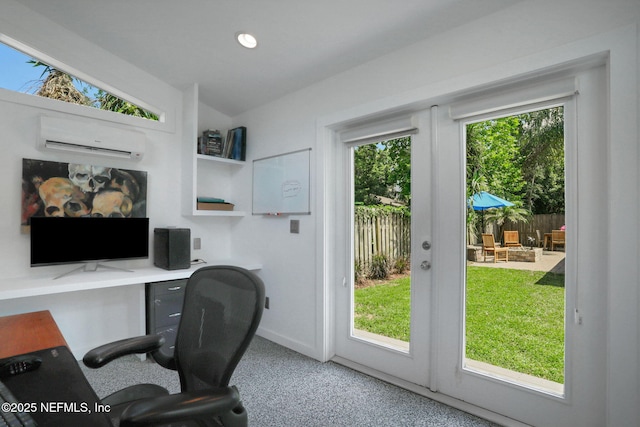 1257 12th St N, Jacksonville Beach, FL 32250 - office area featuring a wall mounted air conditioner, carpet flooring, and baseboards