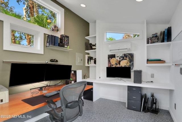 1257 12th St N, Jacksonville Beach, FL 32250 - office area featuring a wall mounted AC, baseboards, healthy amount of natural light, recessed lighting, and speckled floor
