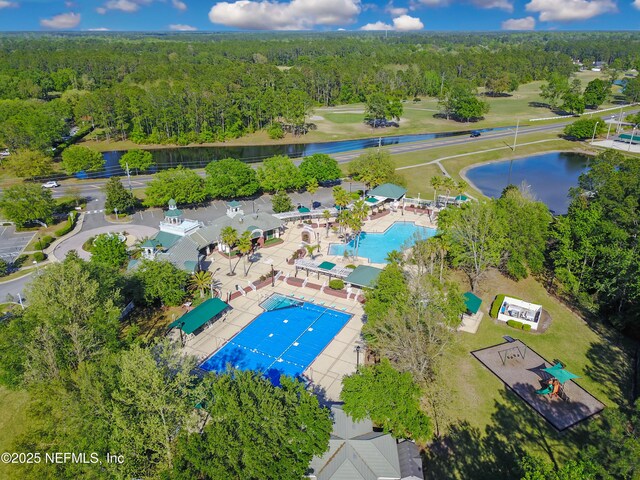 1800 Rear Admiral Ln, Saint Johns, FL 32259 - drone / aerial view of a forest, a pool area, and a nearby body of water