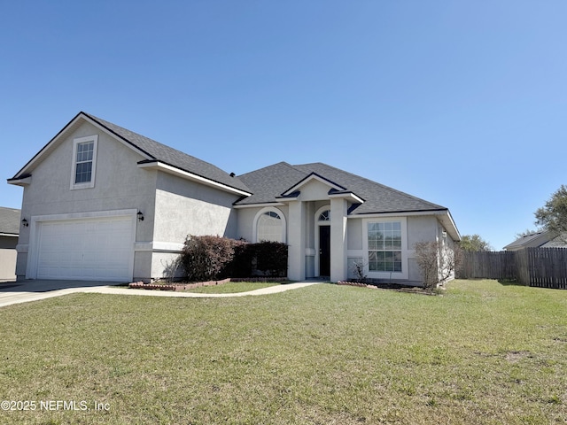 view of front facade featuring a garage, driveway, stucco siding, and roof with shingles