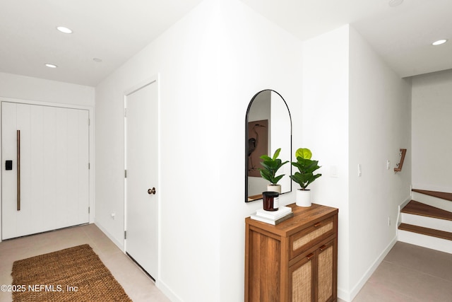 114 12th Ave S Unit 102, Jacksonville Beach, FL 32250 - hallway featuring recessed lighting, stairway, and light tile patterned flooring