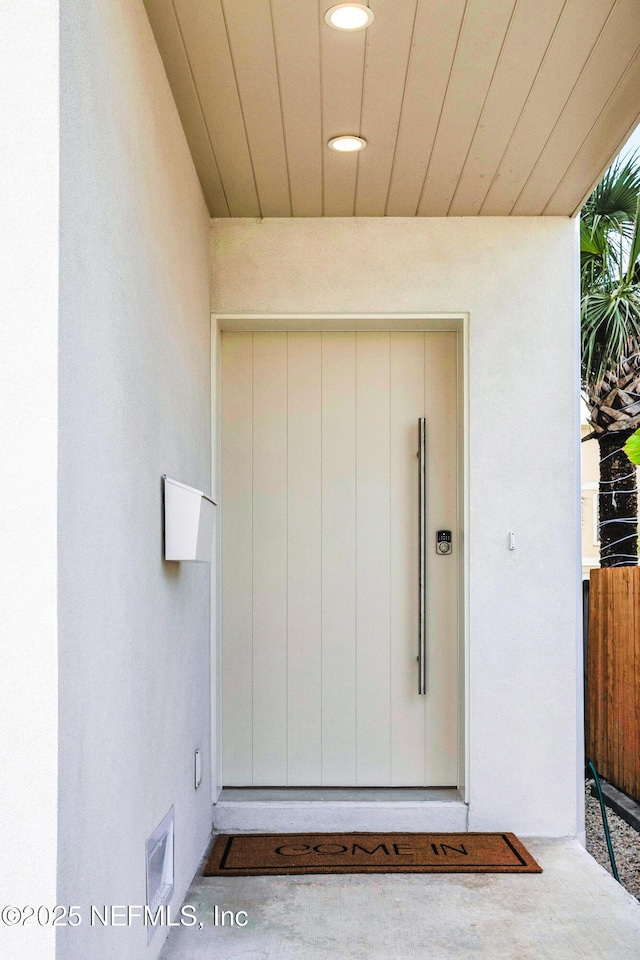 114 12th Ave S Unit 102, Jacksonville Beach, FL 32250 - property entrance with stucco siding