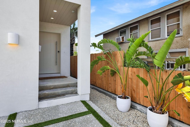 114 12th Ave S Unit 102, Jacksonville Beach, FL 32250 - entrance to property with stucco siding and cooling unit