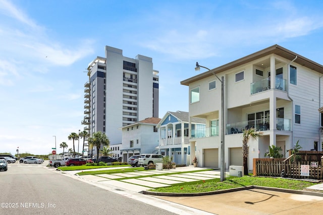 114 12th Ave S Unit 102, Jacksonville Beach, FL 32250 - view of property with an attached garage