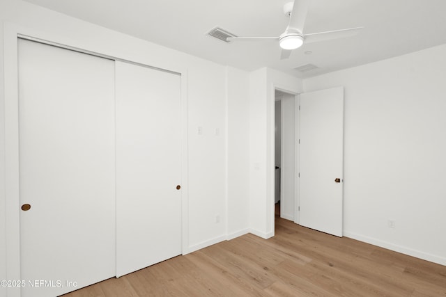 114 12th Ave S Unit 102, Jacksonville Beach, FL 32250 - unfurnished bedroom featuring light wood finished floors, a closet, and ceiling fan
