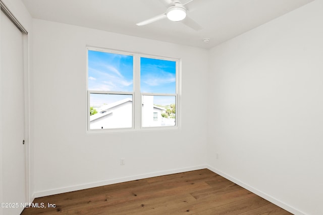 114 12th Ave S Unit 102, Jacksonville Beach, FL 32250 - unfurnished room featuring ceiling fan, wood finished floors, and a smoke detector