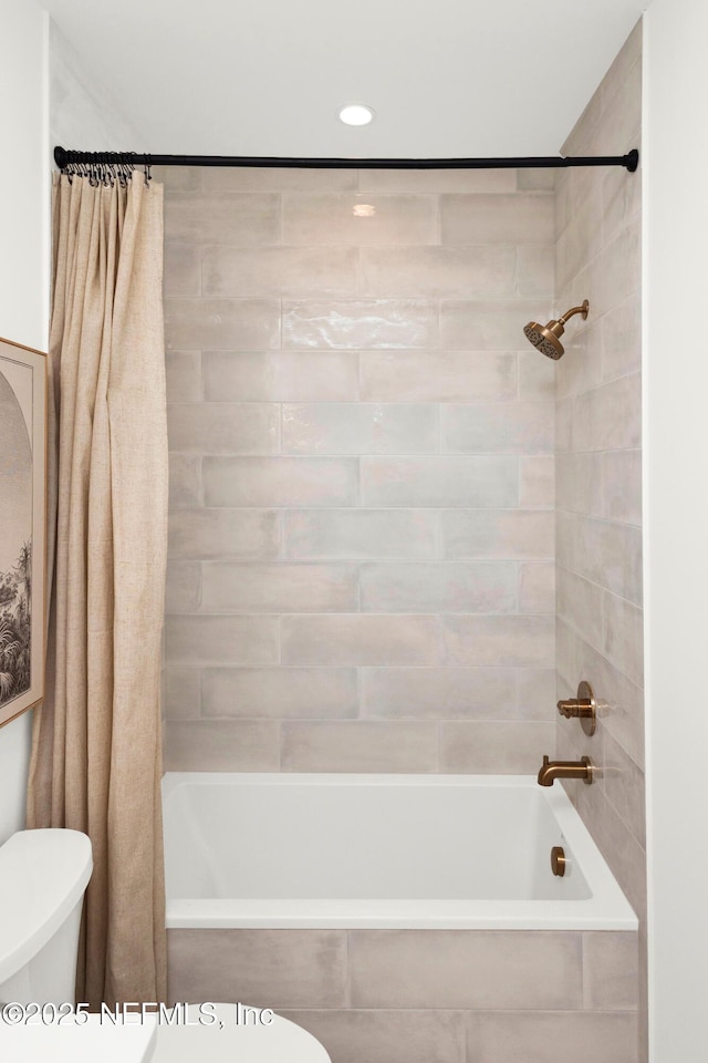 114 12th Ave S Unit 102, Jacksonville Beach, FL 32250 - bathroom featuring shower / bathtub combination with curtain