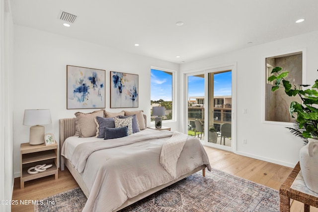 114 12th Ave S Unit 102, Jacksonville Beach, FL 32250 - bedroom with light wood-style floors, access to outside, and recessed lighting
