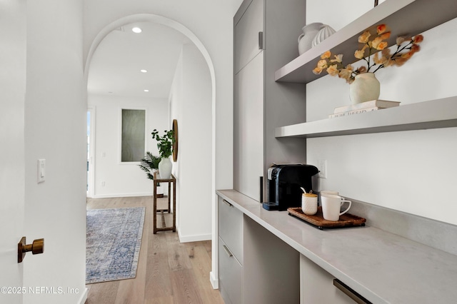 114 12th Ave S Unit 102, Jacksonville Beach, FL 32250 - hall with light wood-type flooring, recessed lighting, and arched walkways