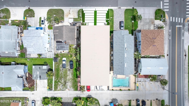 114 12th Ave S Unit 102, Jacksonville Beach, FL 32250 - aerial overview of property's location featuring a pool area and nearby suburban area