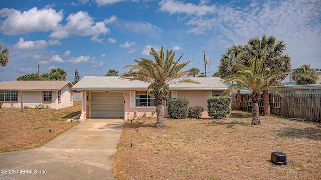 view of front facade featuring driveway and a garage